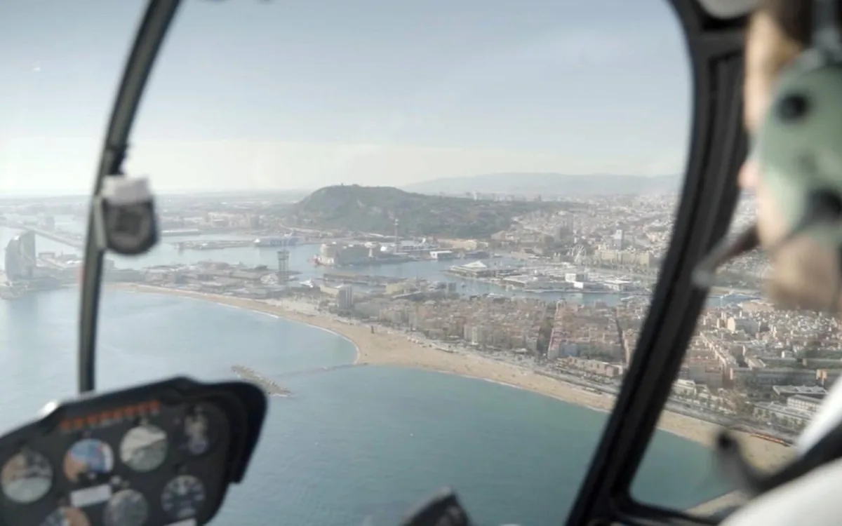 The Barcelona coastline seen from a helicopter cabin