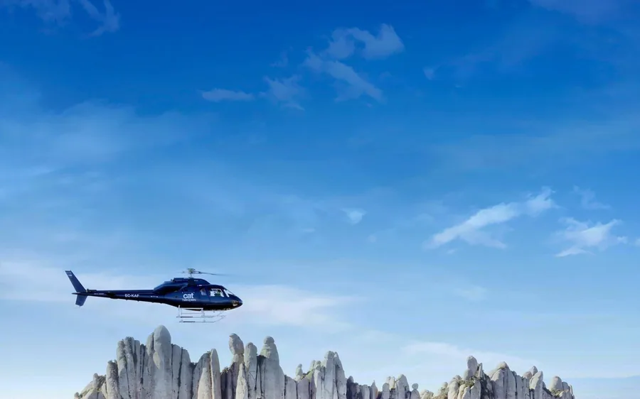 A helicopter above the rock pinnacles of Montserrat